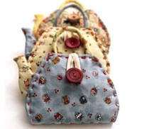 Baju-Baju Tea Pot Needlebook.jpg
